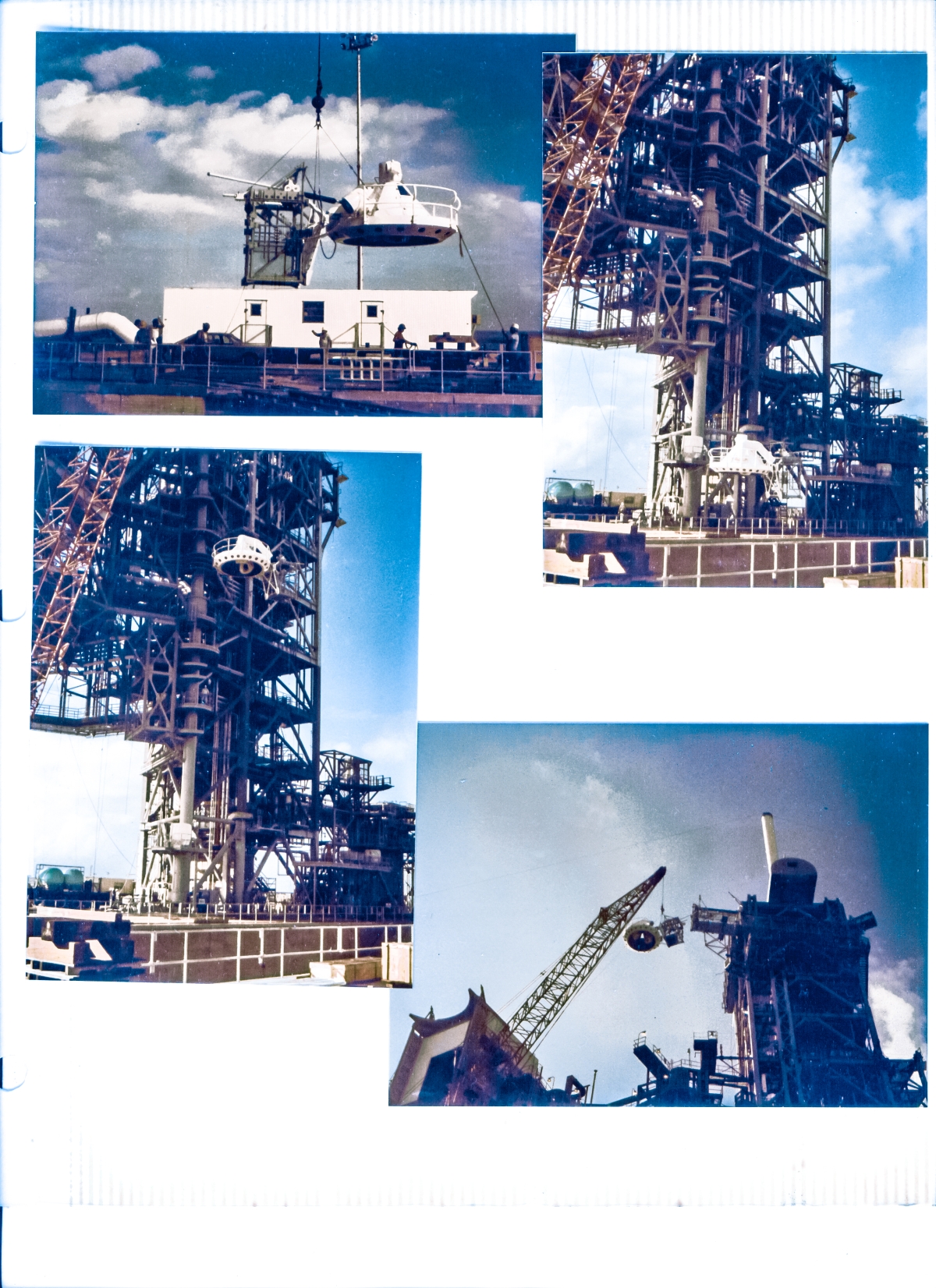 Following the successful installation of its support truss on the Fixed Service Structure at Space Shuttle Launch Complex 39-B, Kennedy Space Center, Florida, The Gox Arm Vent Hood, informally referred to as the “Beanie Cap” is lifted off of its support cribbing in front of Boeing’s TTV trailer over on the east side of the Flame Trench, and is then taken into the sky to be attached to the end of the Gox Arm Main Truss near the top of the FSS.